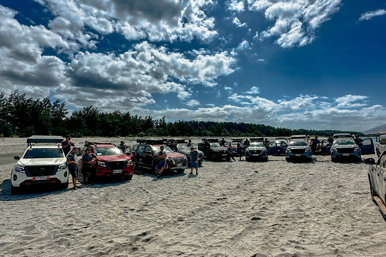 Media participants parked their Nissan Terra and Navara  on a sandy beach.
